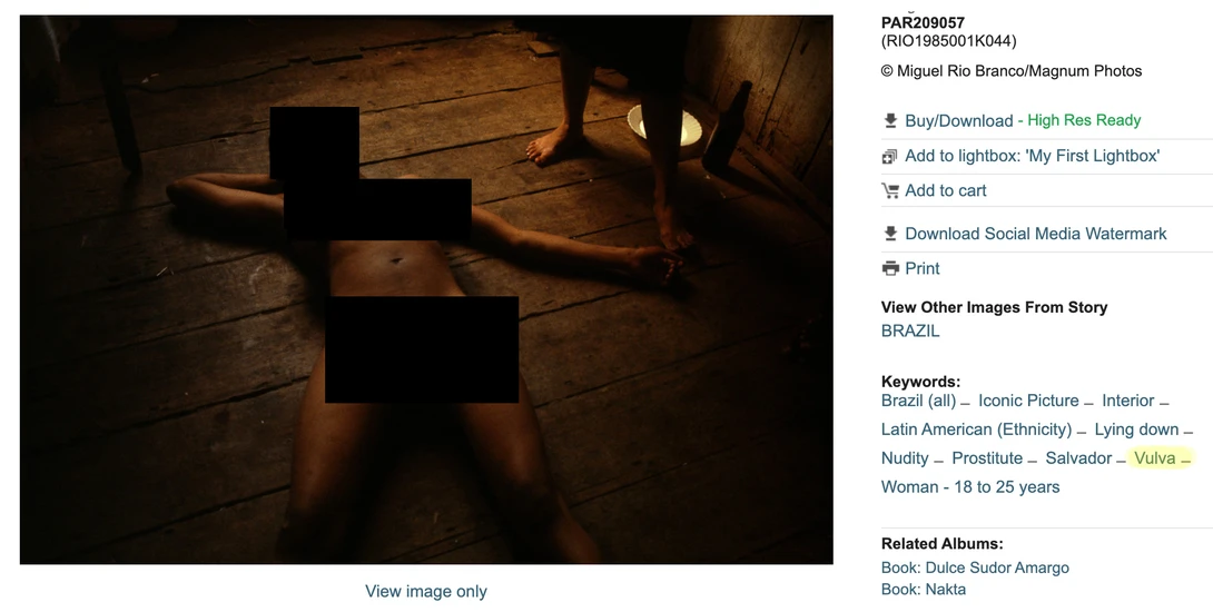 "Prostitute lays on wooden floor." "Vulva" Miguel Rio Branco