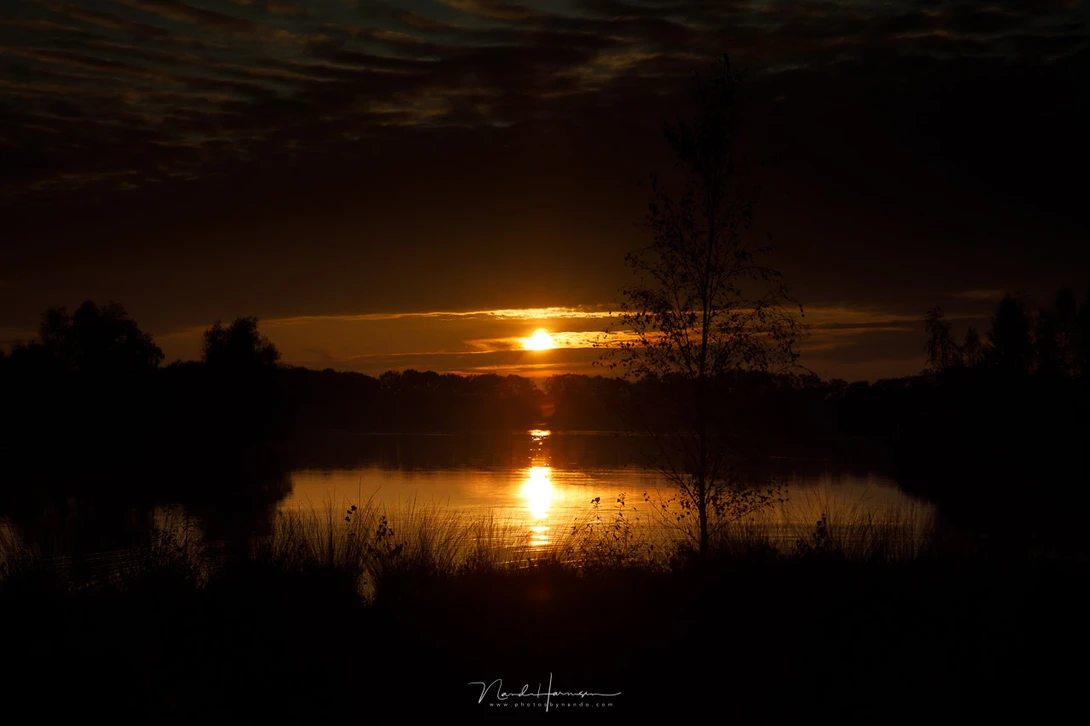 This photo of a sunset is not a low key, even if it has many dark tones. It is just underexposed. Nothing more.