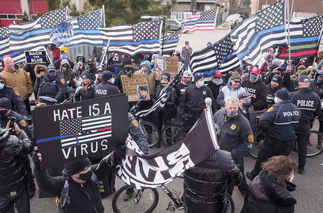 Supporters of the Long Island Peaceful Protest encountered a large group of "Back the Blue" counter-protestors as the march moved past the Smithtown Fire Department on Saturday, March 6, 2021 to protest “thin blue line” flags on fire department trucks.