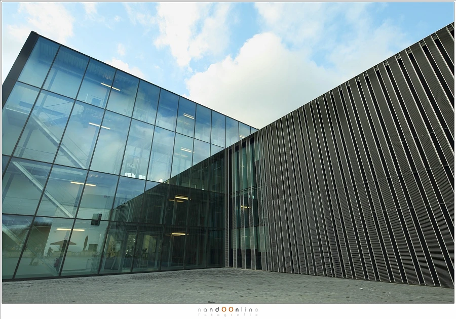 With a 17mm wide angle lens this is the result with this building. By tilting upwards the perspective distortion is huge.