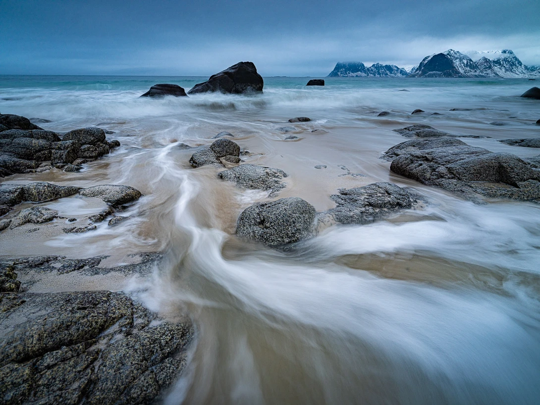 Shot at Lofoten with a prime. I have the ability to crop in post-processing, which gives me a bit more flexibility.