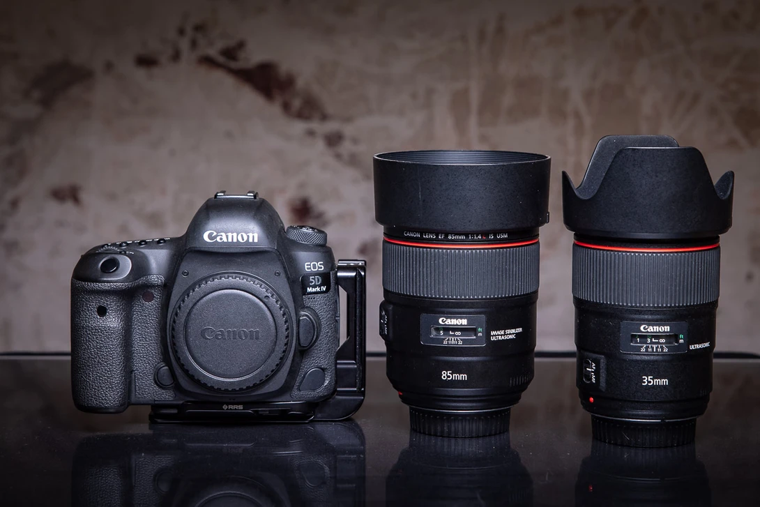 My favorite combination for weddings and portrait photography. I also use a 135mm lens next to these two.