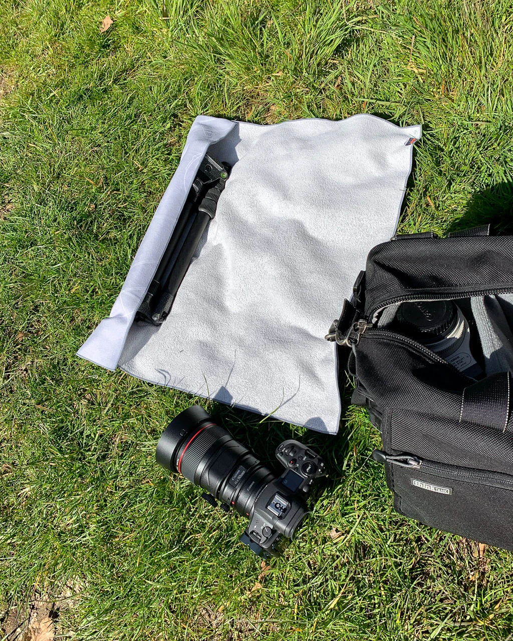 The large size can even wrap a travel tripod. But a flat surface is advisable for a good wrap.