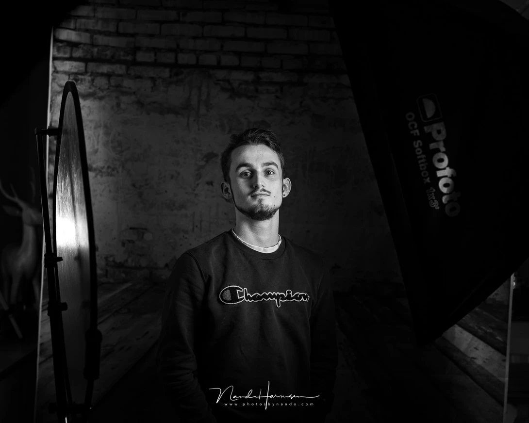 My son Aillas, ready for the shoot. The Rembrandt light based setup is just playing safe.&nbsp;