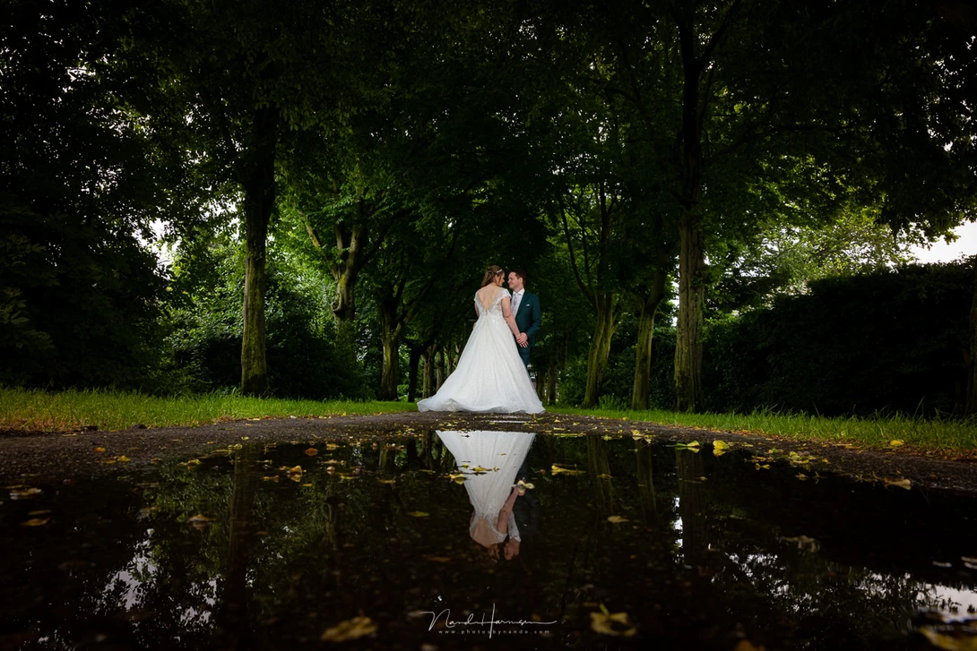 Just a rain puddle can be enough. For this one the camera was lying on the ground, just a centimeter from the water. I only need to correct the crooked horizon line.