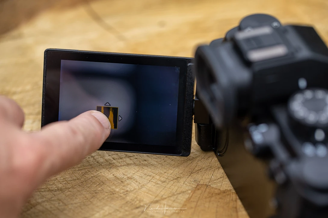 If you don't like the location of the histogram on the LCD screen, just swipe it to another location.