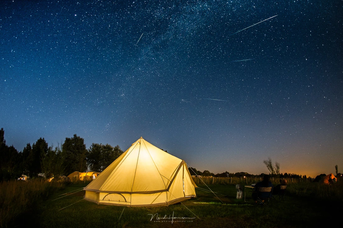 Enjoying company while watching the night sky for Perseid meteors.