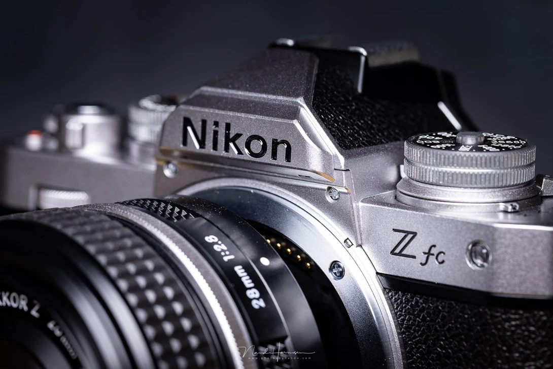 Lens alignment is a bit awkward. The white dot has to be aligned with the small dent above the screw in the bayonet.