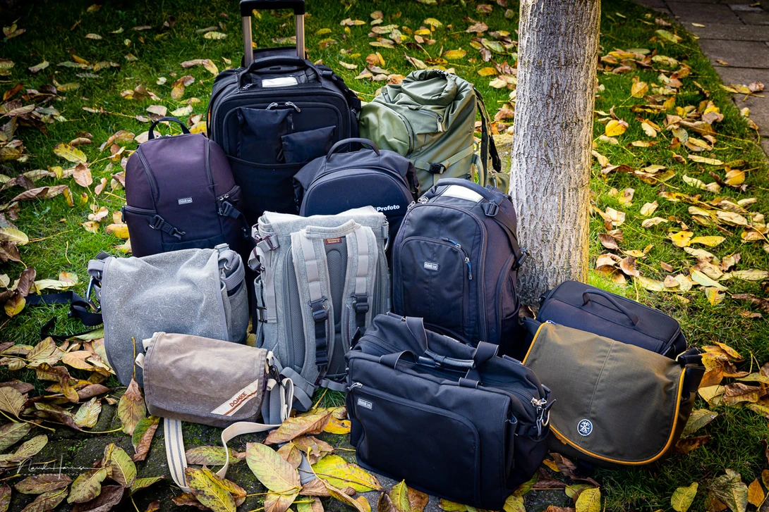 Find yourself a decent bag that suits your needs. It will keep that expensive camera safe. But it will be another expense.