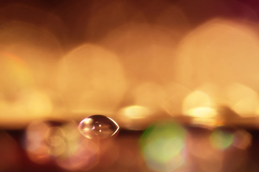 An old CD with some water droplets and a narrow depth of field. You can see the bokeh rings that gives the image more atmosphere.