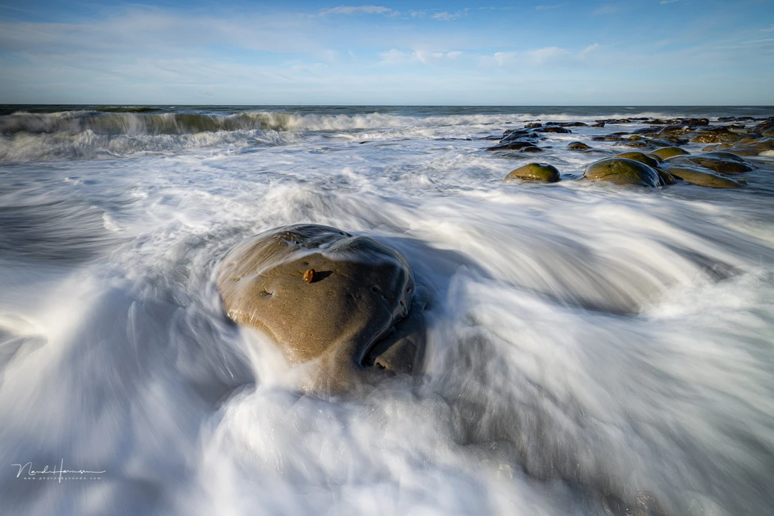 Using a desired shutter speed by chosing the appropriate ND filter together with&nbsp;a hard edges GND filter.