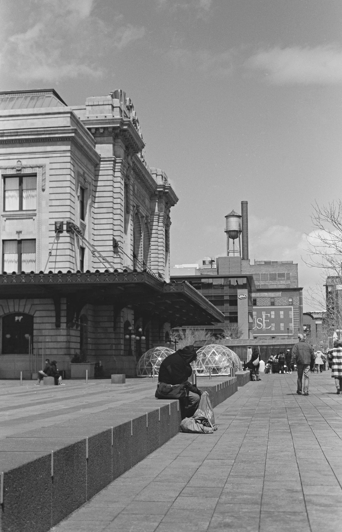 Developing Kodak TMax 100 in D-76 1+3 with proper metering off mid-tones can yield exceptional tonal range.