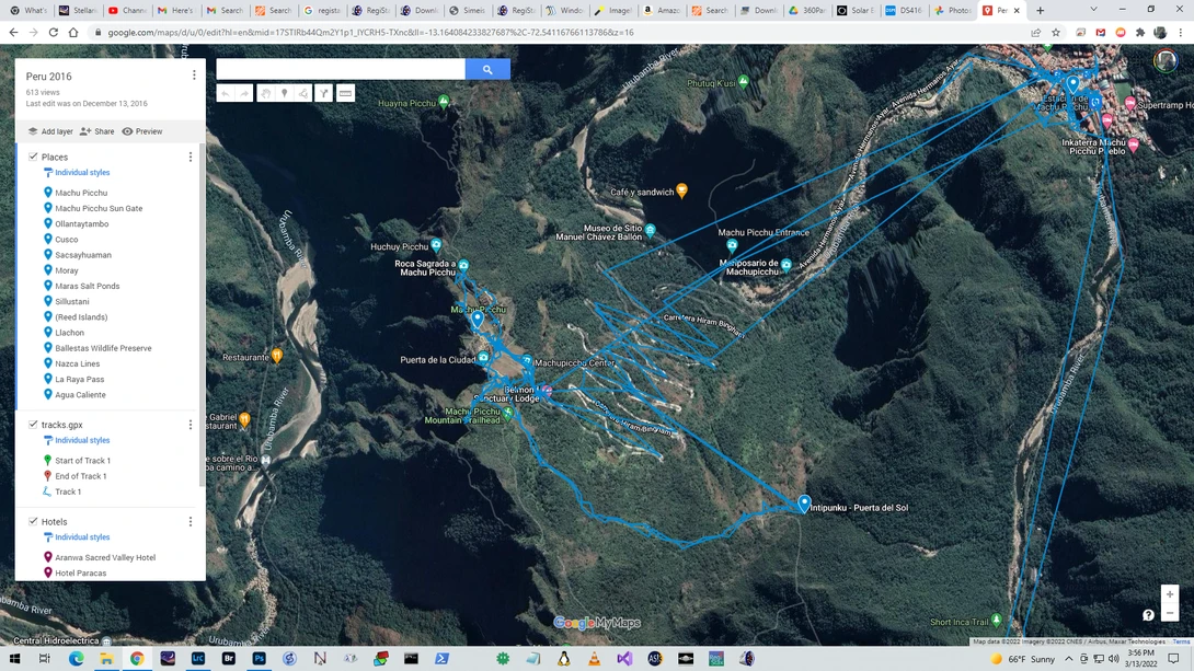 Screenshot of Google Maps showing a satellite view of a mountainous region with blue route lines and location markers overlaid.