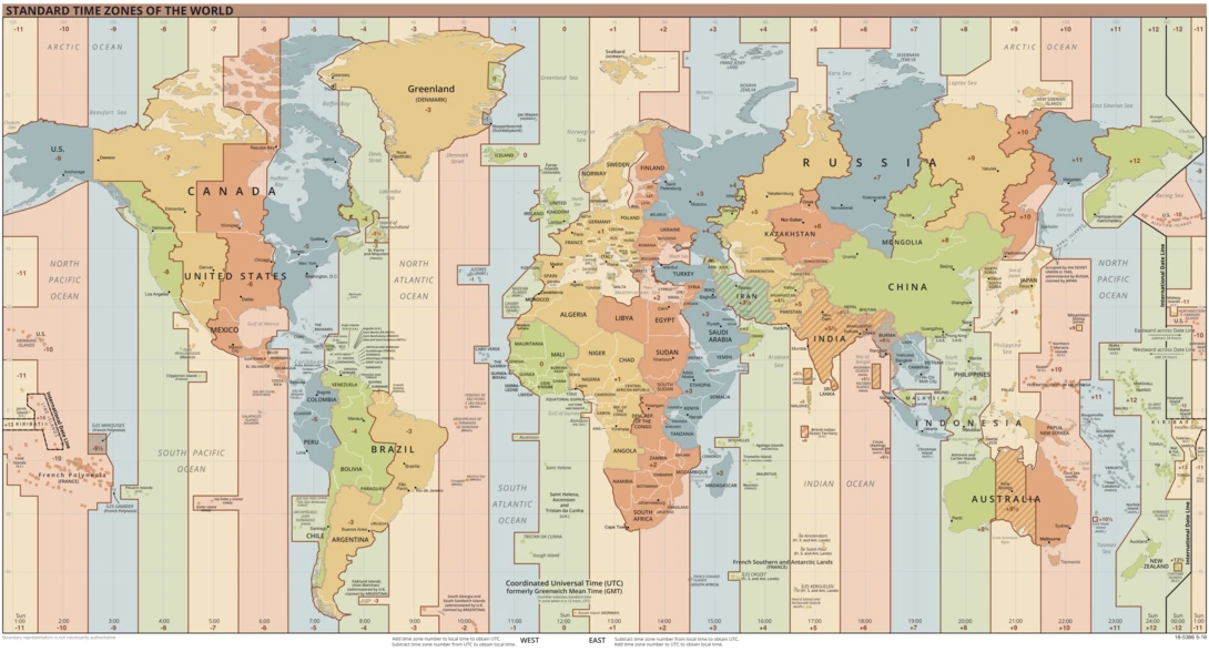 Standard time zones of the world map showing color-coded regions across all continents.