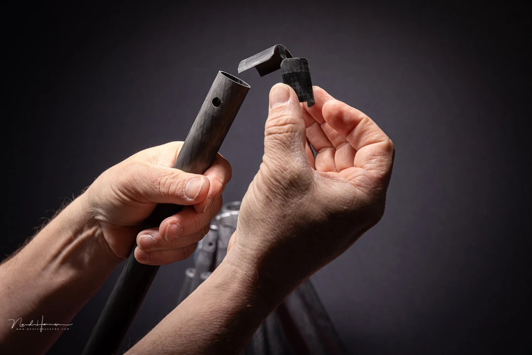 The Gitzo Mountaineer has a different designed plastic guidance part