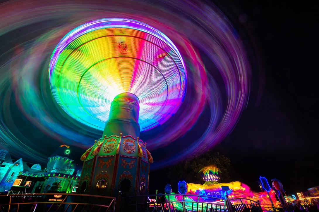 Try to see how a spinning fairground attraction is moving and try to find the best composition.