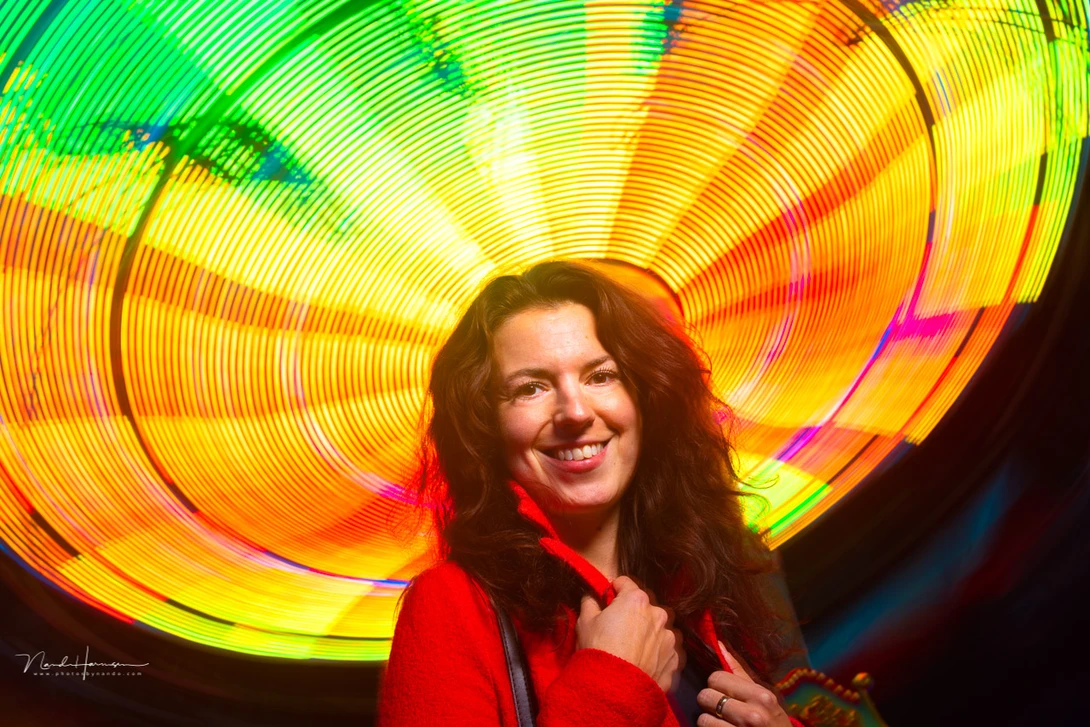 By seeing the movement of attractions, you can find fun compositions with your model. I used fill-in flash and a longer shutterspeed, obviously.