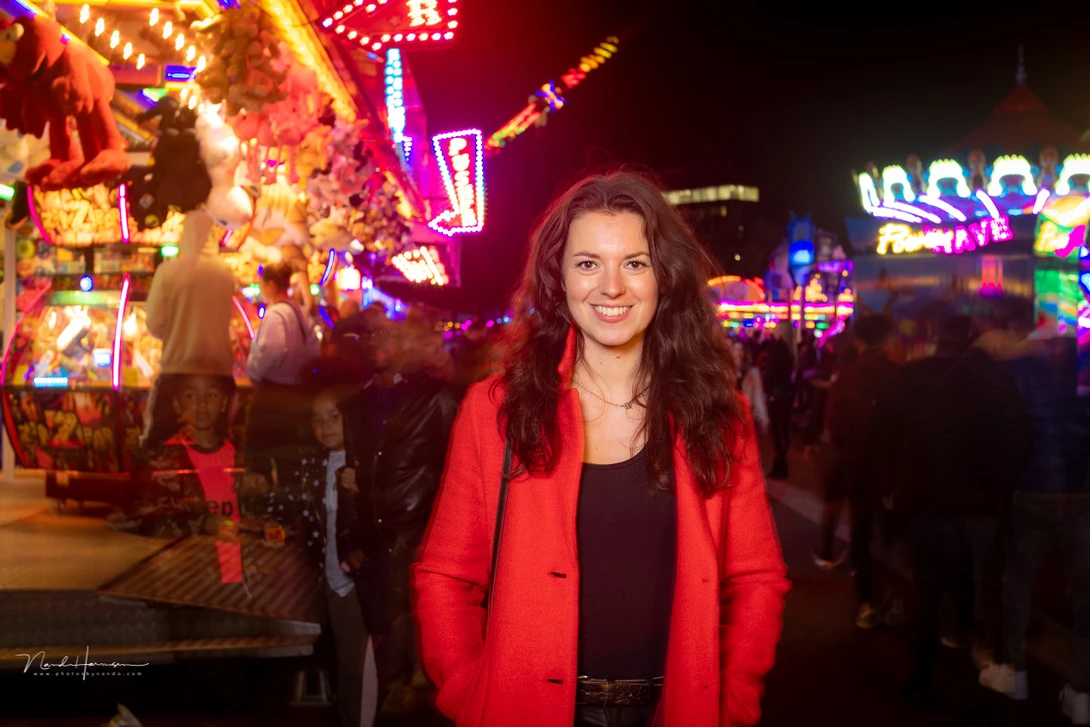 Ask visitors to pose, or bring your own model. Merge the ambient exposure with the flash light.