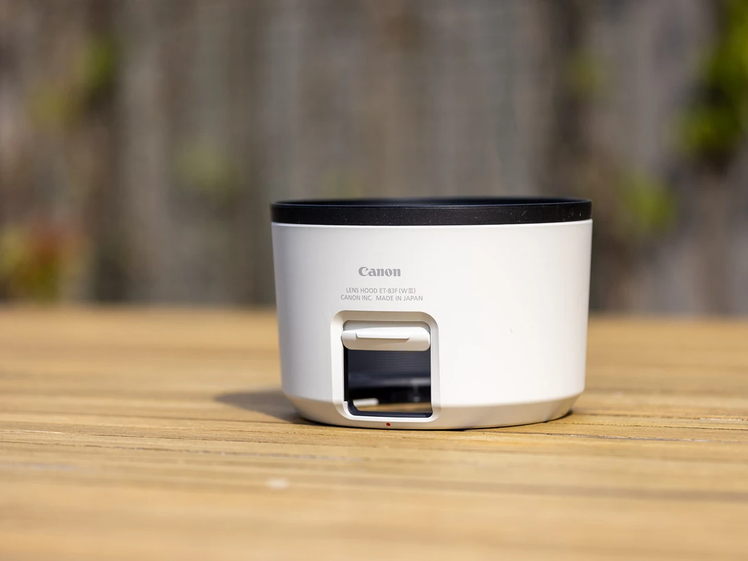 Most deep lens hoods have an opening that allows you to rotate a polarization filter.