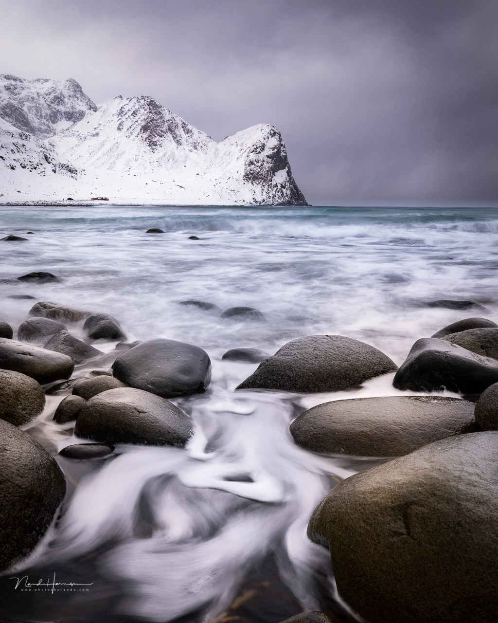 These boulders are a great subject. But if you stand in-between, don't run away if a wave hits you. It's too dangerous.