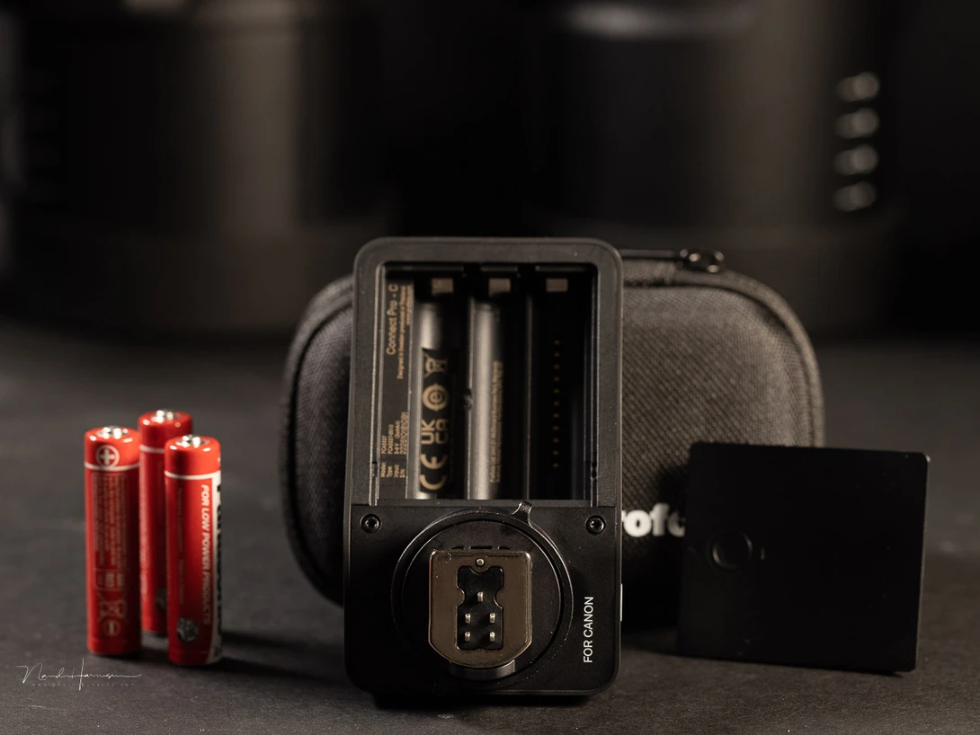 The battery compartiment is on the bottom. It accepts three triple A batteries.