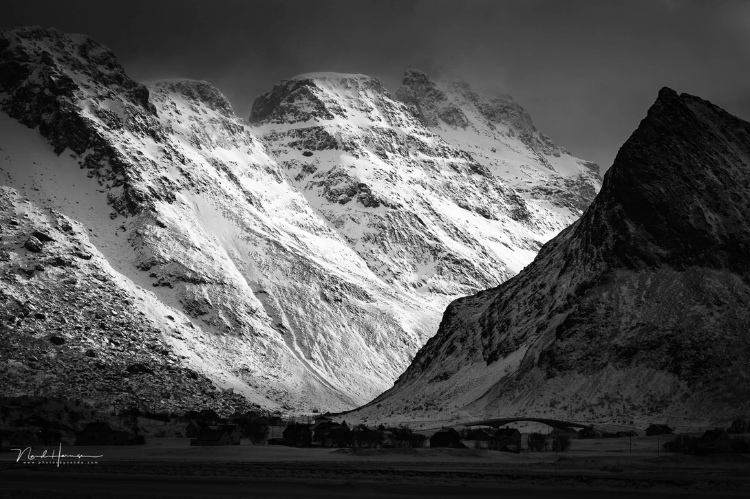 Light and shadow on the mountains of Lofoten. I don't think it's a depressing photo. How do you feel about it?