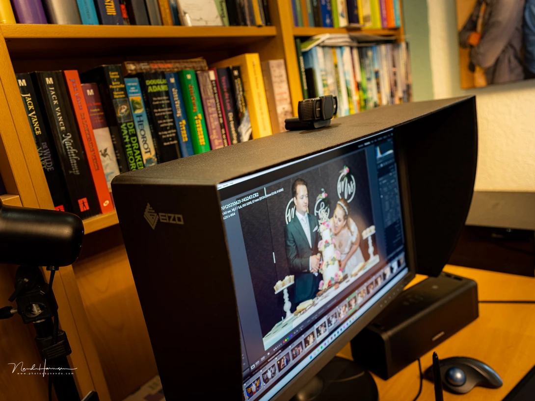 The light shielding hood is easily placed or removed. It attaches by magnet. It's sturdy enough to hold my webcam, even when placed at the front edge.