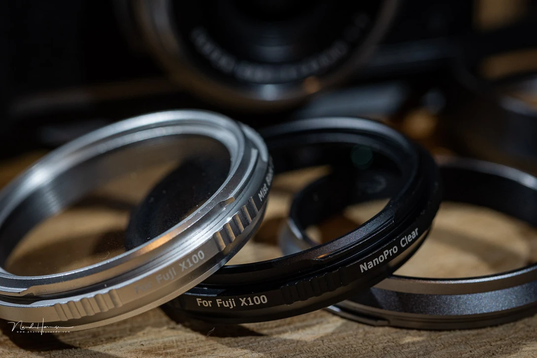 The filter with the silver finish didn't have a black matte inside. It's probably a pre-production model since all filters have the black matte to prevent refllections.