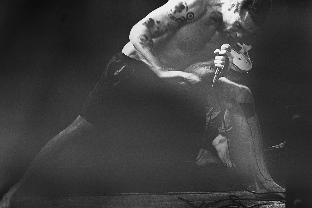 A scan from the negative film. One of the images of a Henri Rollins concert back in 1994, in a dark and obscure venue. I used an Ilford HP4 black and white film, exposed at 1,600 ASA, which is ISO1,600 nowadays.&nbsp;