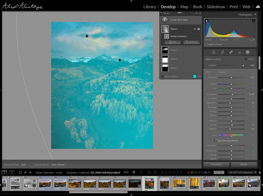Screenshot of photo editing software displaying aerial landscape with turquoise water and forested mountains.