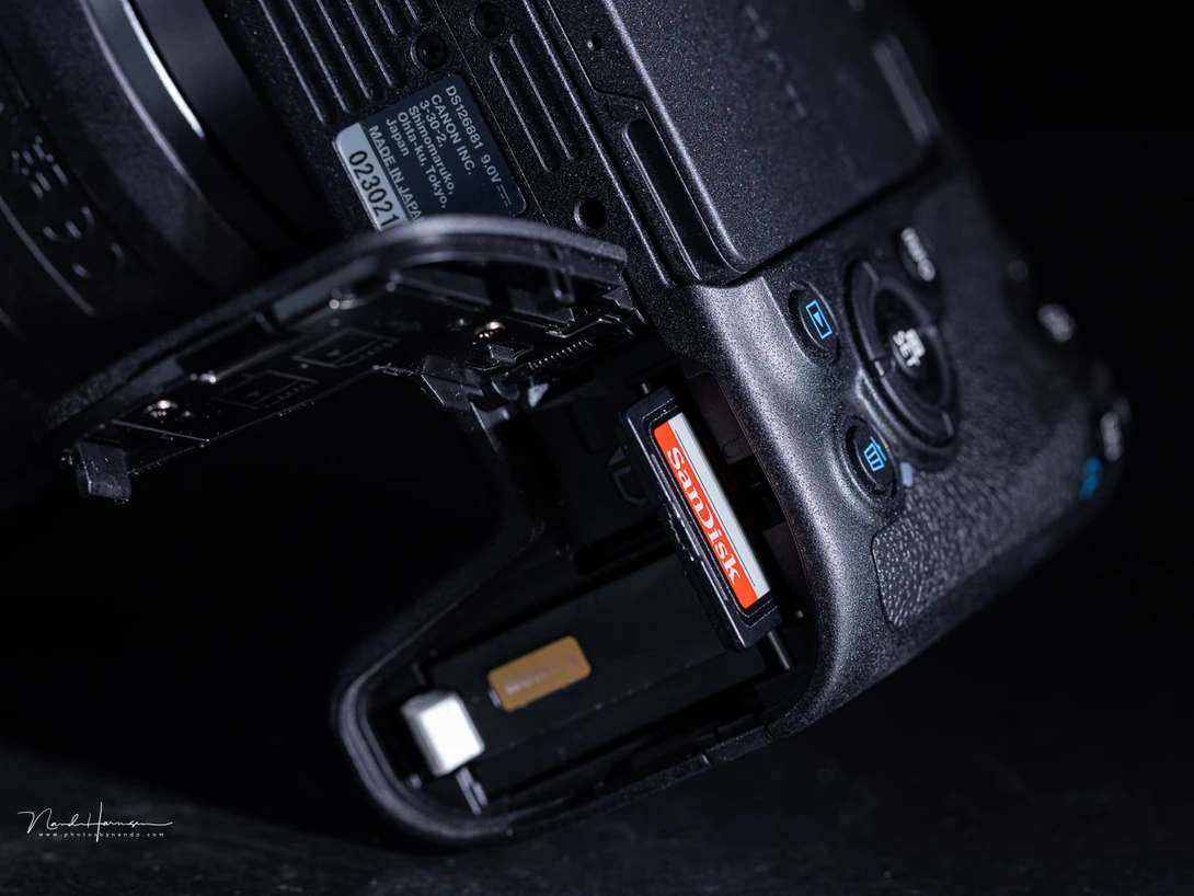 A small body only allows for a small battery. The memory card slot is also located in the battery compartiment.