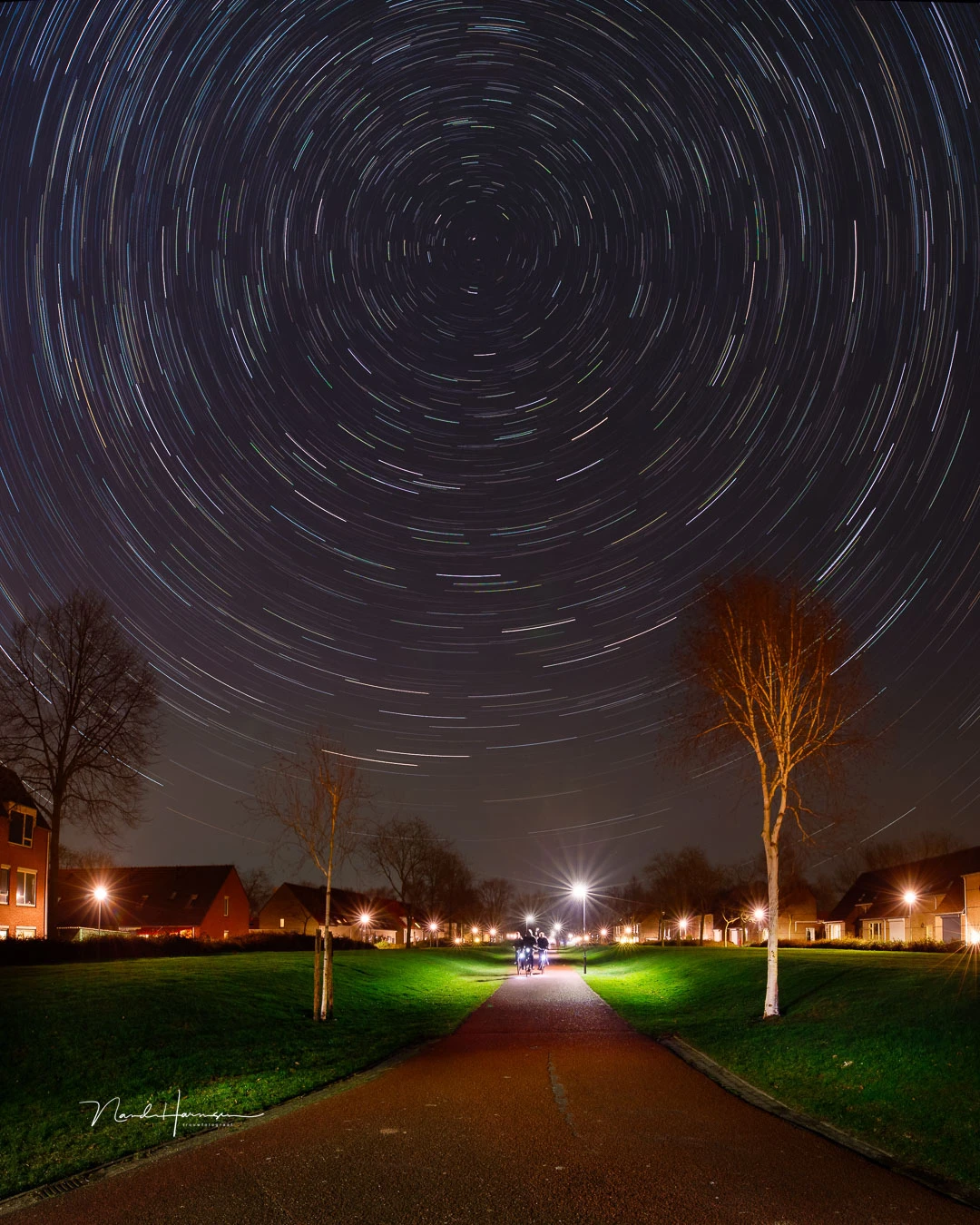More stars become visible with high ISO values. A high ISO was also used to capture the persons on the road.