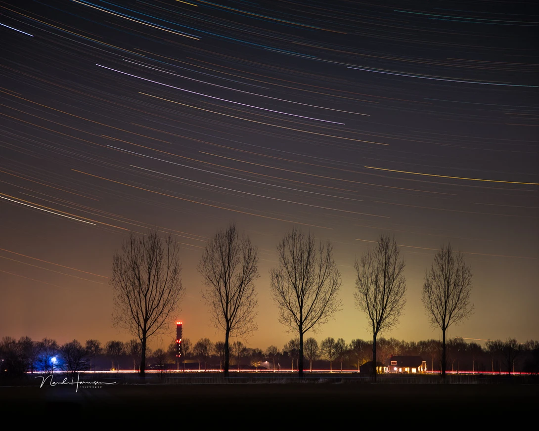 If you use startrails as an addition for your subject, a longer focal length can be used without any problem. Use the lines of the trails for your composition.