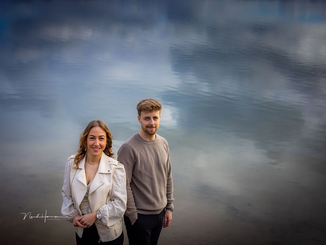 The 50mm angle of view allowed me to capture brother and sister in front of a pond with nothing but the reflection of the clouds.