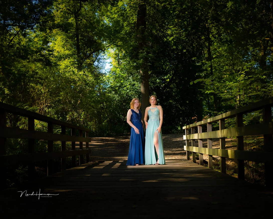 Two sisters, ready for the prom. I used a 50mm lens for this composition. This field of view makes it a wonderful focal length for this kind of photography.