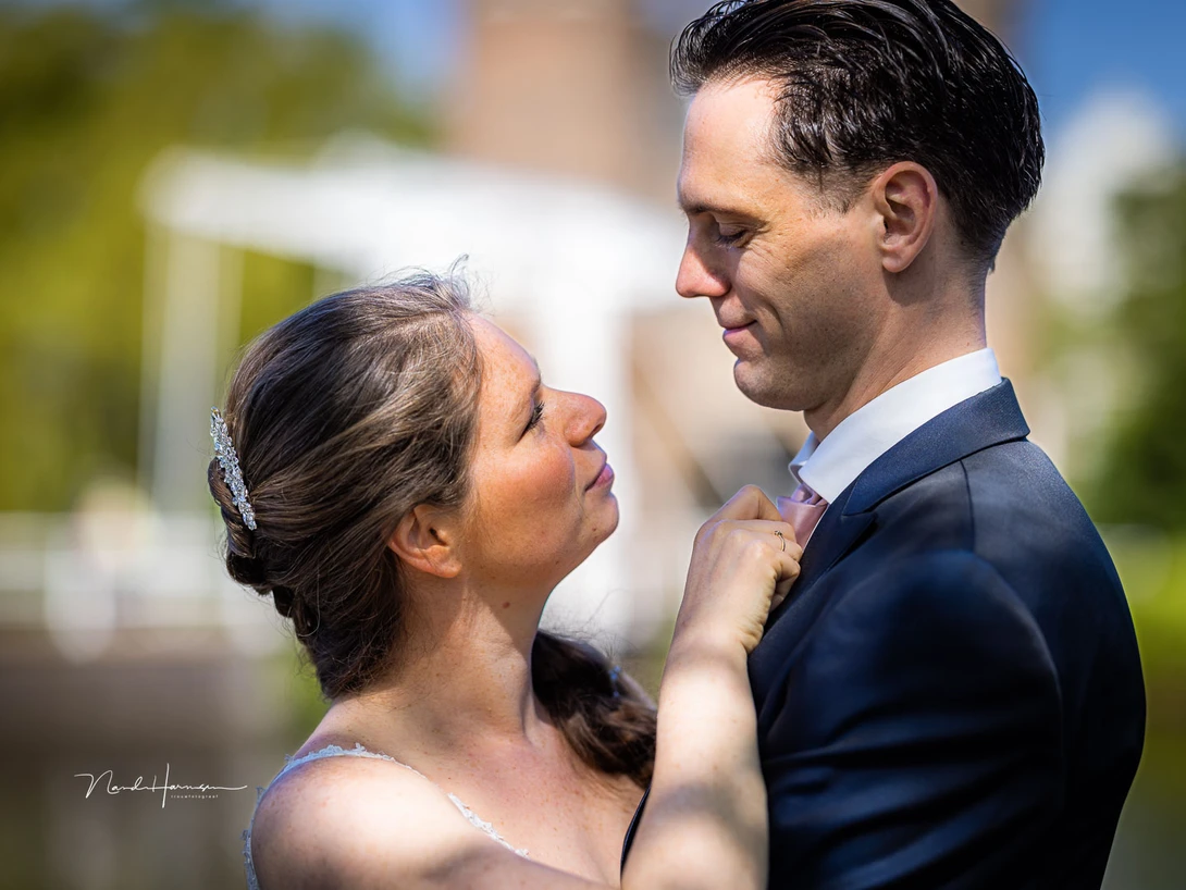 I love the 85mm f/1.2 lens for intimate photos of wedding couples. The narrow field of view is perfect for a nice background as well.
