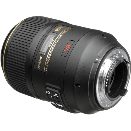 Nikon macro telephoto lens with internal focus mechanism shown from rear three-quarter angle against white background.