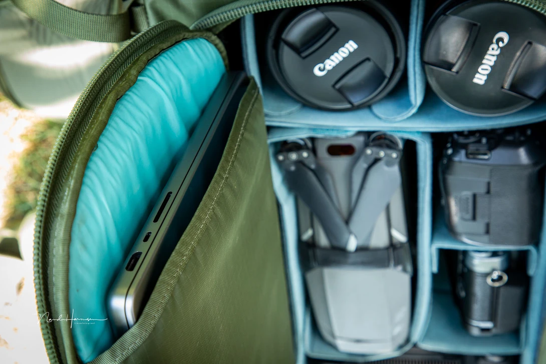 I don't like the location of the laptop sleeve. It will slide out if you open the back access panel.