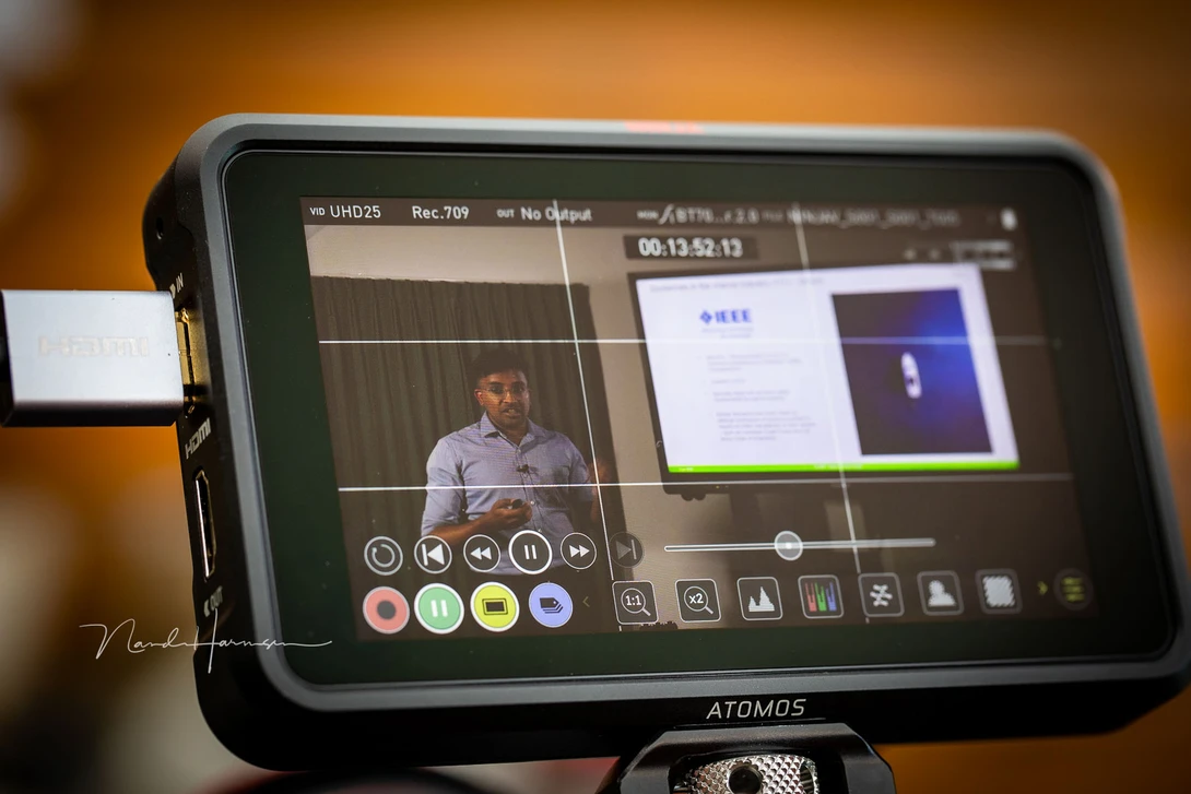 Checking the recorded footage on screen after a test recording.