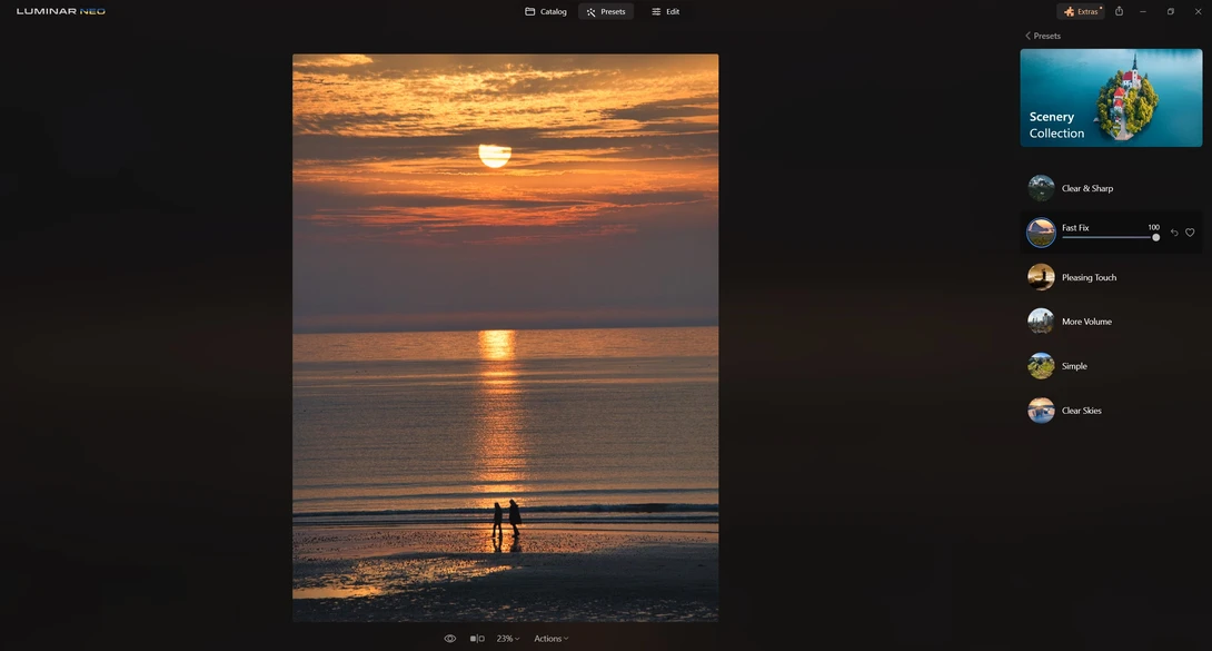 Two silhouetted figures standing in shallow ocean water during golden hour sunset with sun reflecting on water.
