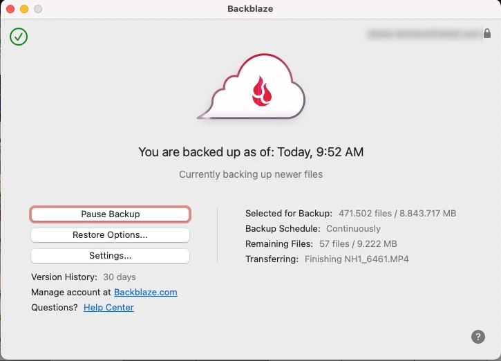 I use Backblaze. It works in the background. Of course, there are other options.