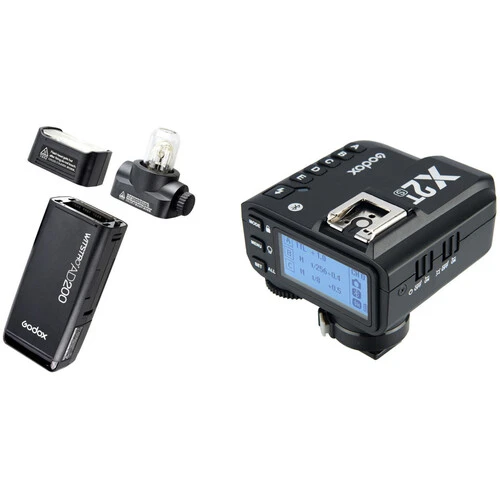 Wireless camera trigger system with transmitter, receiver, and flash sync components.