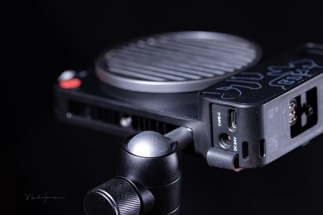 The power connector and PD-USB-C port are at the bottom, protected by a rubber cover.