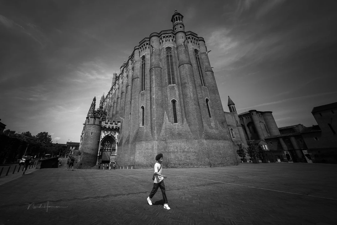You don't need autofocus for this kind of photography. With f/8 everything is in focus, unless you get really close. This is the largest brick stone building in the world: the Sainte Cecile Cathedral in Albi, France.