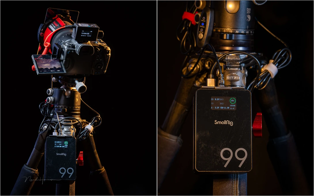 Professional cinema camera rig mounted on tripod with external monitor and red follow focus wheel.