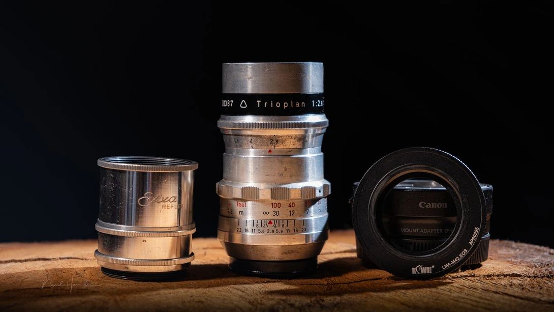 The extension tubes, Meyer-Optik Görlitz Trioplan 100mm f/2.8, and the adapter rings that are necessary to mount the lens onto a modern mirrorless camera.