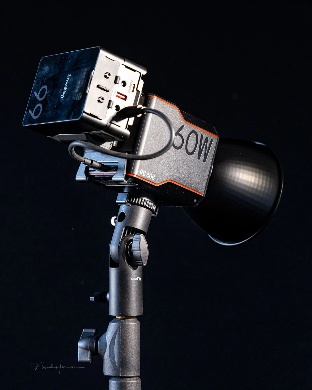 The bracket is designed with slim power banks in mind. A larger one like the SmallRig VB99 mini V-mount doesn't fit that well.