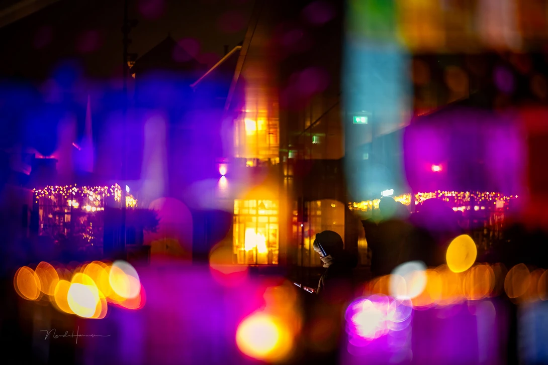 An in-camera double exposure during the light festival called GLOW in the Netherlands. I captured the person first and added the out-of-focus lights of the festival in the next exposure. Captured with the Helios 44-2 on a Canon EOS R5.