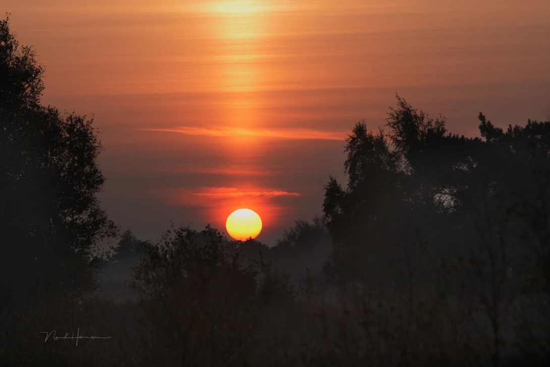 A beautiful sun pillar at sunrise.