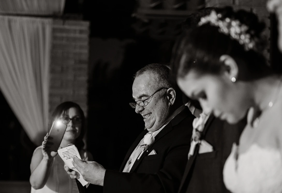Father gives toast during wedding reception